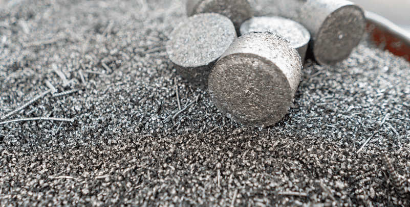 Magnesium tablets on a bed of magnesium powder, promoting health benefits.