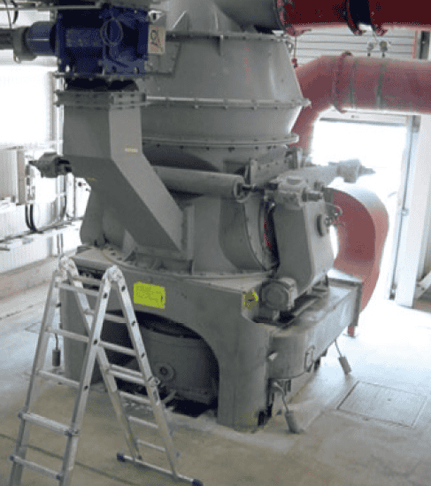 Industrial fluidized lime processing machine for efficient chemical reactions.